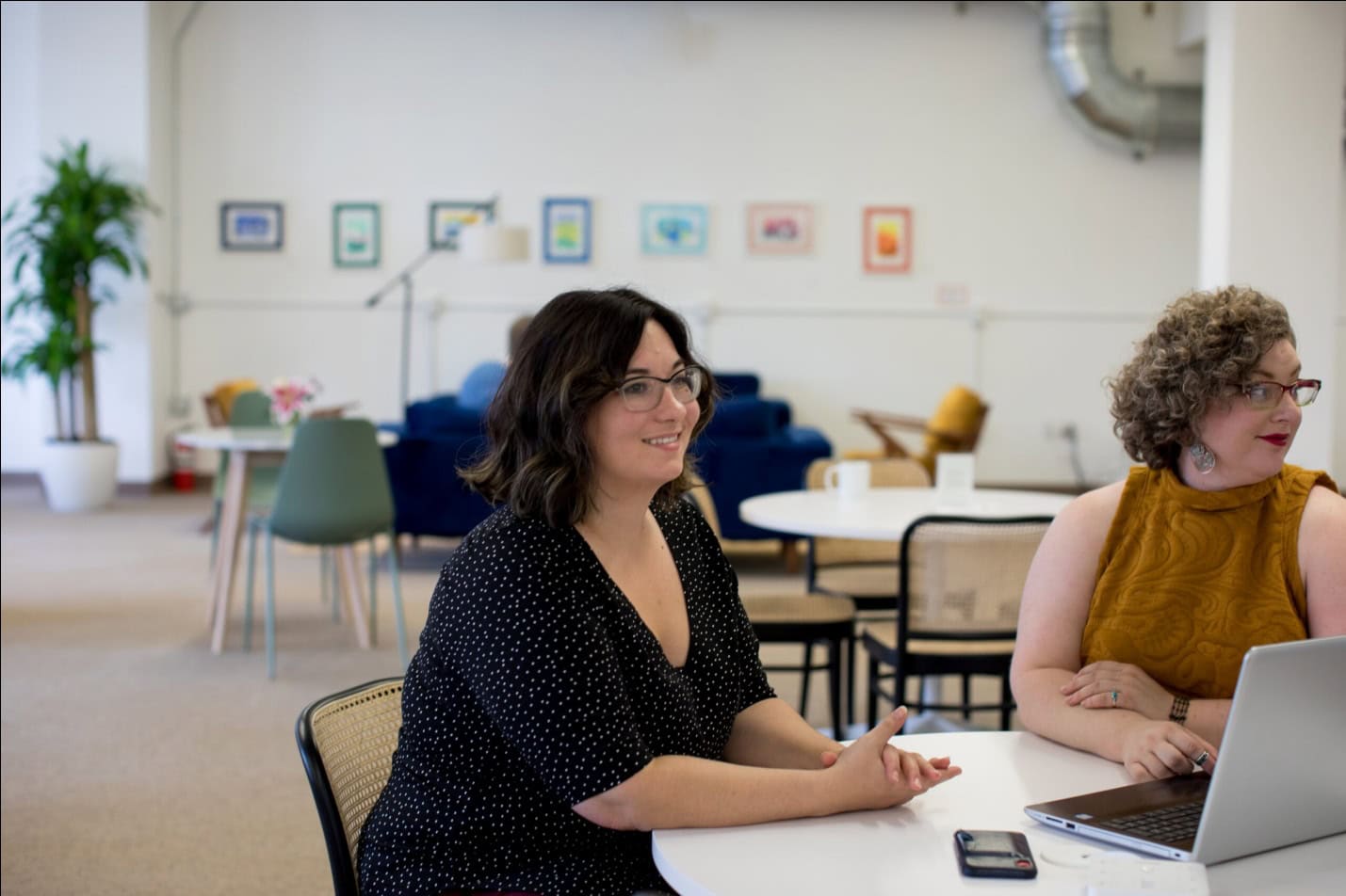 Happy employees in a workplace.