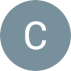 A gray circle with a white letter "C" centered inside, set against a light gray background.