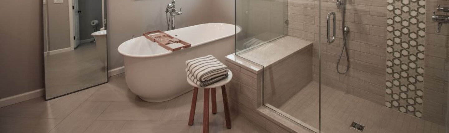 Modern and neutral bathroom inspiration with tub and shower