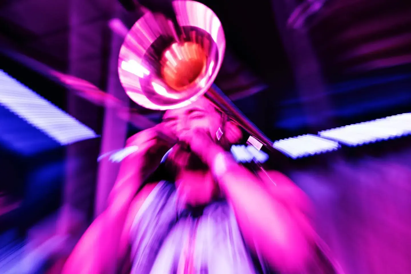 A vibrant live music performance with colorful stage lighting in Eureka Springs.