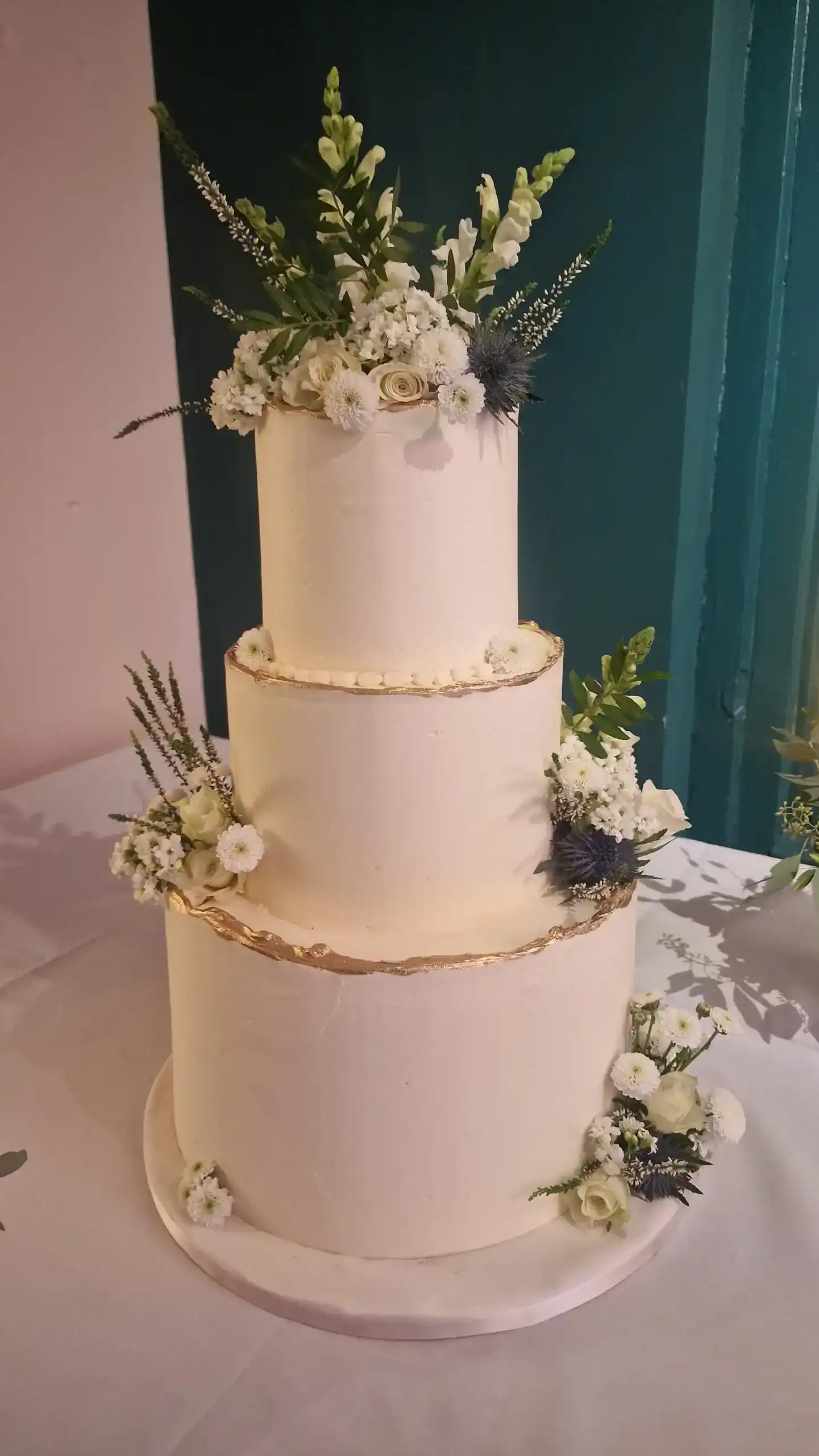 Luxury bespoke wedding cake with buttercream finish in London