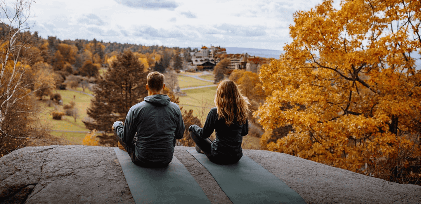 Man and Woman Doing Yoga During a Fall Getaway in Upstate New York at Mohonk