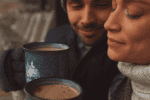 Couple Enjoying Hot Chocolate Together During a Romantic Winter Weekend Getaways in Upstate NY