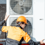 an HVAC tech doing a central air conditioner installation
