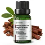 Flacone AMYRON da 15 ml di olio essenziale di Legno di Rosa con legno e foglie di Aniba rosaeodora
