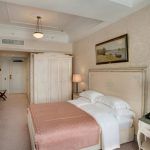 Hotel room photography with mixed lighting sources. This professional image by Kirill Toll captures the ambiance of a Russian hotel interior. Available for assignments in Moscow region towns including Khimki, Dolgoprudny, Lobnya.