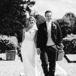 bride and groom portraits in the gardens at eaves hall lancashire