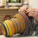 Man weaving basket