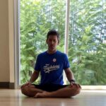 man meditating sitting down