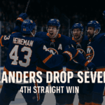 Emil Heineman celebrates after scoring for the New York Islanders against Detroit