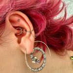 daith helix tragus lobe piercing Budapest