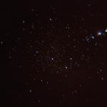 Captivating view of stars shining in the vast night sky, showcasing the beauty of the cosmos.