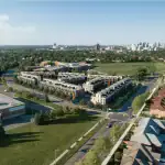 Aerial drone view of the Presto Towns Scarborough development site, showcasing the master-planned townhome community integrated into a lush, green residential neighborhood near local shopping and parks.