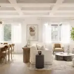Bright and airy living and dining room interior at The Heights of Harmony East, featuring a marble-surround fireplace, a large wooden dining table with globe lighting, and expansive windows with sheer curtains.