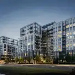 Exterior architectural rendering of Narrative Condos, showing modern mid-rise condominium buildings with white and grey facades, large grid-style windows illuminated at dusk, glass balconies, and landscaped streetscape with trees and cars.