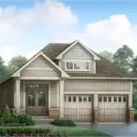Modern 37-foot detached home design at Serene at Belmont, showcasing a neutral siding exterior, brick accents, a double garage, and a peaked roofline with a dormer window.