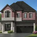 Vicinity detached home featuring a two-car garage, red brick exterior, and stone accents.