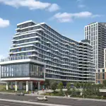 Modern mid-rise exterior architecture of The Kith Condominiums featuring a curved facade and spacious balconies.