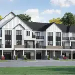 Hawthorne East Village - Village Homes A row of white farmhouse-style Village Homes in Hawthorne East Village showcasing vertical board-and-batten siding, spacious balconies, and integrated garages.