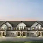 Exterior elevation of a row of modern townhomes at Cachet Binbrook, featuring a mix of stone and siding accents with integrated garages.