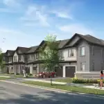 Architectural rendering of a residential streetscape at Winchester Estates, showing modern multi-story townhomes with grey and white siding, manicured lawns, a community entrance sign, and people walking on the sidewalk.