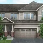 Modern farmhouse style townhouse at Orchard South with gray vertical siding, a two-car garage, brick accents, and a covered front porch entryway.