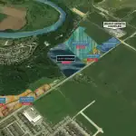Aerial site map for Simply Grand community developments showing the Riverbend Townhomes location near the Grand River and Brant Sports Complex, with surrounding "Sold Out" phases like Watercolours and Expressions.