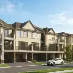 Exterior rendering of the Chateau 9 Townhome Collection in Stouffville, featuring modern three-story architecture with stone and stucco facades, spacious balconies, and integrated garages under a clear blue sky.
