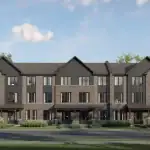 Exterior view of Rear Lane townhouses at Creekview Collective in Milton showcasing modern brick and dark wood siding architecture with covered entryways.