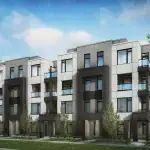 Modern four-story stacked townhouse exterior at Ellia at Unity in Markham, featuring contemporary grey and white facade, large windows, and private glass balconies surrounded by professional landscaping.
