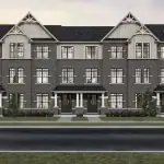 Architectural front elevation of SouthCal rear lane townhomes featuring a classic grey brick exterior, elegant gables with cream siding accents, arched windows, and welcoming covered front porches with white pillars.