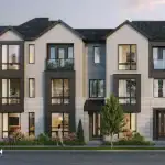 Modern three-story luxury townhouses by Madison Group at Unionglen Markham, showcasing contemporary white brick, large floor-to-ceiling windows, and sleek black metal accents.