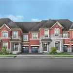 Street-level view of Fern Series townhomes at Unionglen Markham, showcasing red brick facades, grey stone accents, and integrated single-car garages in a master-planned community by Greenpark Group.