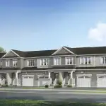 A row of elegant freehold townhomes in the Woodstone Trails community, Dundalk, featuring peaked rooflines, grey siding and brick accents, and white-railed front porches.