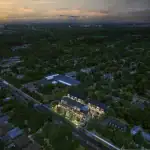 Aerial twilight view of the Thornhill Heights luxury townhome development surrounded by lush green trees and residential neighborhoods.