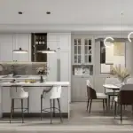 Luxury modern kitchen interior at Thornhill Heights featuring white cabinetry, a marble waterfall island, gold pendant lighting, and an integrated dining area.