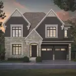 Luxury estate home design for The Legacy in Burlington, featuring a transitional exterior with dark brick upper gables, light stone lower accents, and a wide two-car garage.