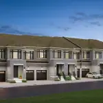Dusk rendering of a block of luxury townhomes at Kingshaven, highlighting gray stone facades, dark garage doors, illuminated entryways, and modern architectural design under a twilight sky.