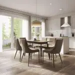 Bright, modern interior rendering of a Harwood Place dining area and kitchen, featuring a wooden table with neutral upholstered chairs, a woven pendant light, light oak flooring, and large sliding glass patio doors.