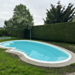 Referenzen 2 ©Terramore-Bodendesign_IMG_0995 Pool mit Steinteppich Umrandung