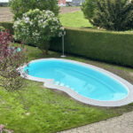 Referenzen 1 ©Terramore-Bodendesign_IMG_1308 Pool mit Steinteppich Umrandung