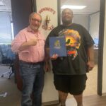 Winner’s Circle celebration photo from The Texas Bulldog Law Firm in Houston.