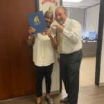 Houston injury client celebrates final settlement at The Texas Bulldog’s office.