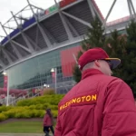 Stephen Anderson Phenix Group client enjoying a game at the stadium after achieving financial freedom