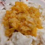 Top view of Egg yok fish mixture over fluffy egg whites