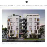 Contemporary white apartment building with geometric forms and recessed balconies, featuring large windows and rooftop greenery.