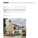 Modern residential house with a mixed material facade, featuring wood and stucco exterior, angular roofline, and large windows, set in a landscaped suburban environment.