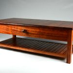 Stained Coachwood Coffee Table. A coffee table commissioned by the Thales Group for a Royal Australian Navy warship. Made in a traditional style and craftsmanship. Custom made timber furniture. Custom made furniture and furniture maker.
