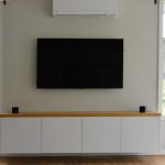 Custom made entertainment unit made for a customer in Beecroft. White oak top finished in white satin poly paint.