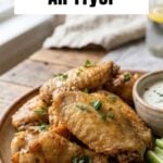 Plate of crispy chicken wings made in the air fryer with frozen chicken wings.
